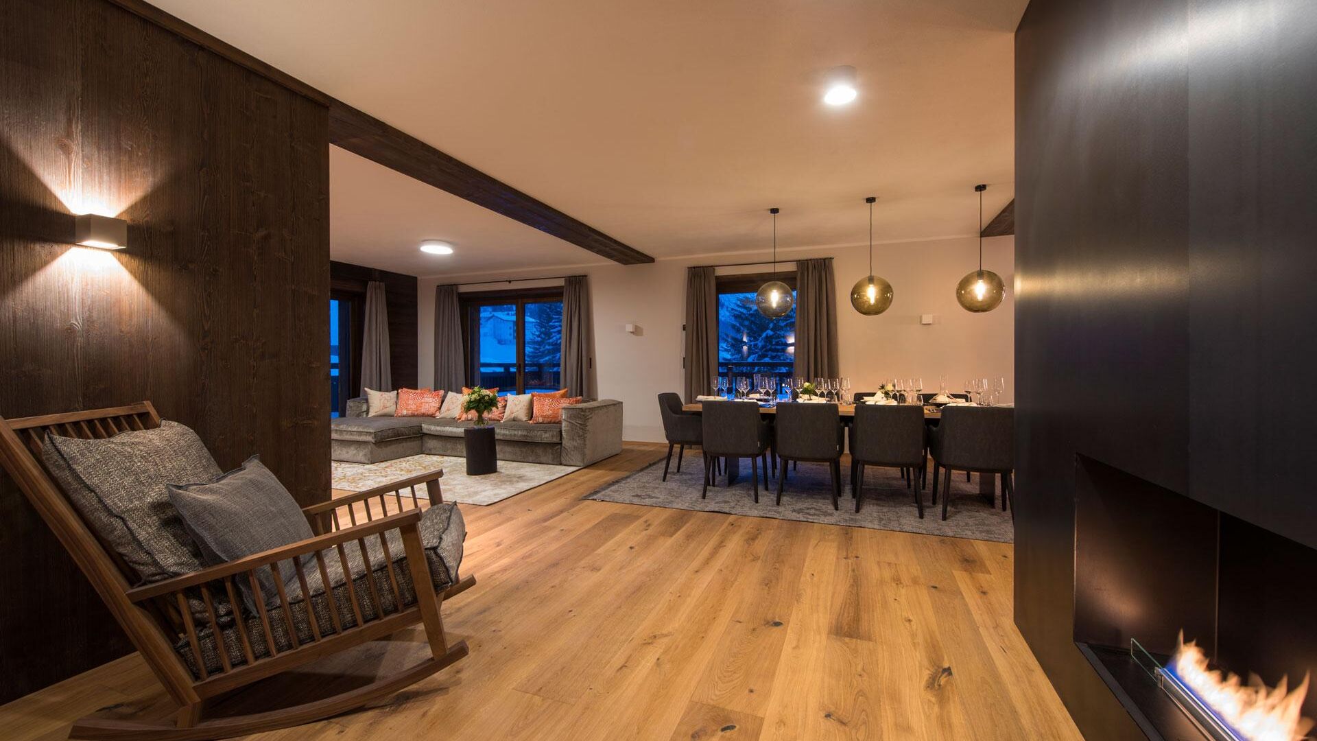 nidus_chalet_lech_wohnraum_kamin_luxusapartment1