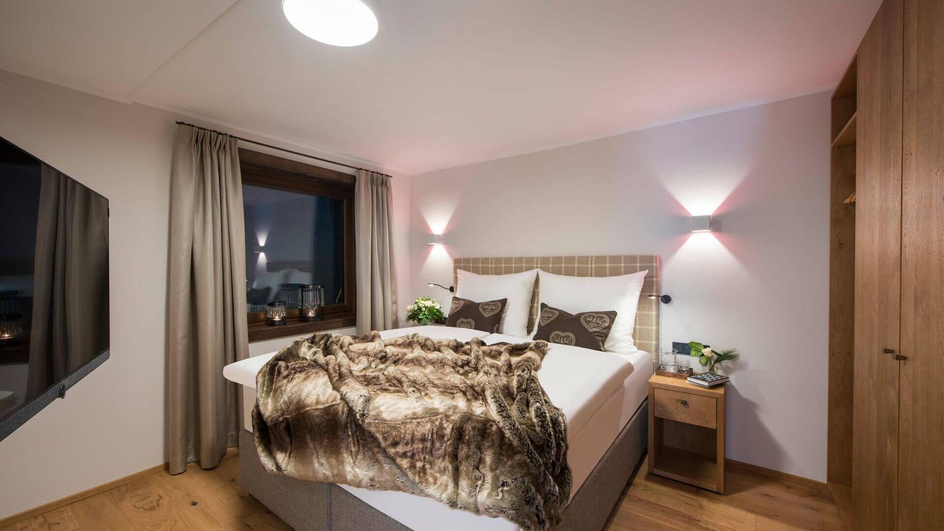 nidus-chalet-lech-parterre-schlafzimmer