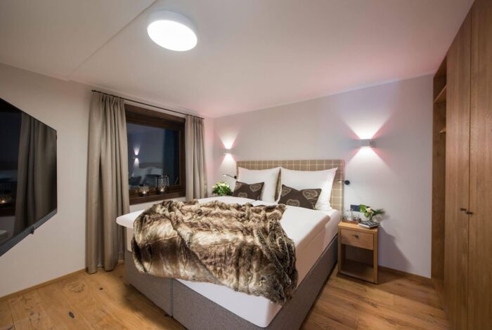 nidus-chalet-lech-parterre-schlafzimmer